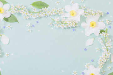 Naklejka na ściany i meble white spring flowers on paper background