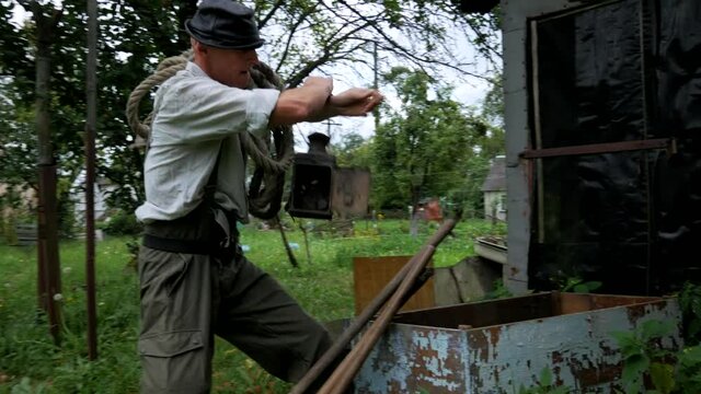 The man takes a shovel, a pickaxe and goes in search of gold, treasures and jewels in the mountains.