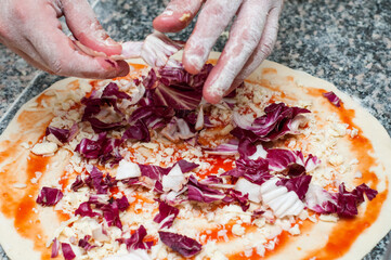 Making of a real italian vegetarian pizza