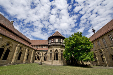 Fototapeta na wymiar Maulbronn Monastery, Germany (cloister from outside): is a former Cistercian abbey and one of the best-preserved in Europe, was named a UNESCO World Heritage Site in 1993.