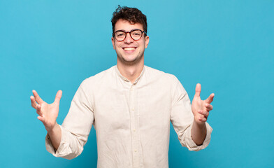 young man feeling happy, astonished, lucky and surprised, like saying omg seriously? Unbelievable