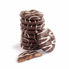 Cookies covered with chocolate on white background