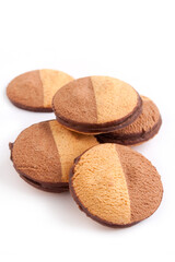Crumbly cookies with chocolate on the white background