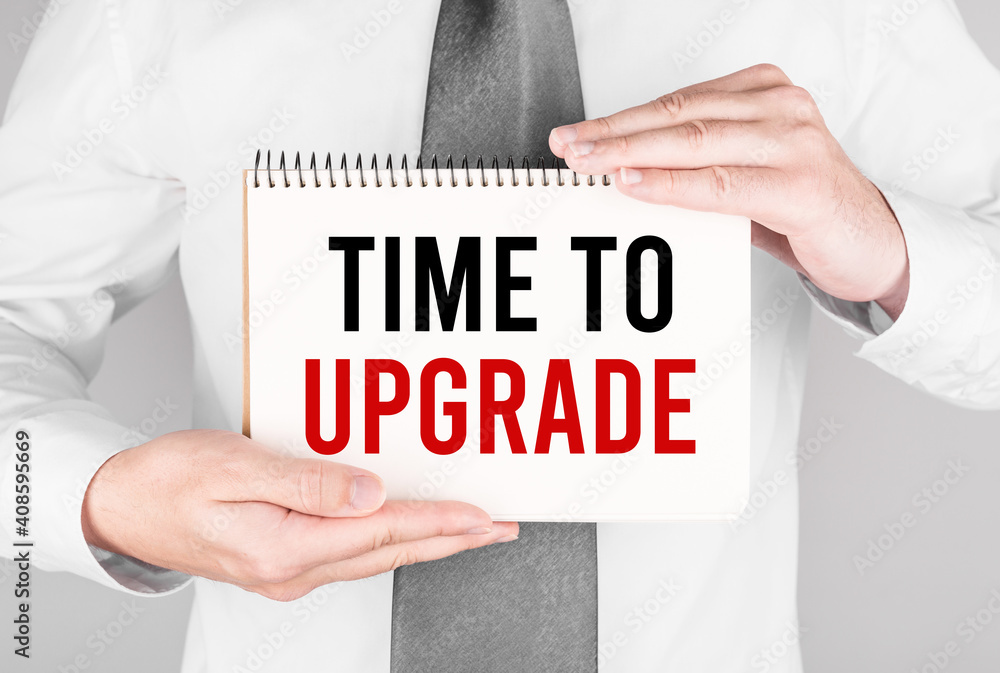 Poster businessman with notebook with text time to upgrade