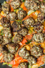 Fototapeta na wymiar Meatballs in a vegetable stew