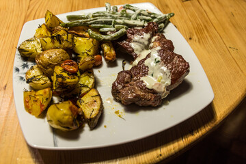 Dish of steak, potatoes and green beans