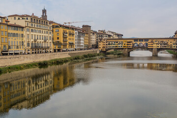 Arno river and Ponte Vecchio bridge in the center of Florence, Italy