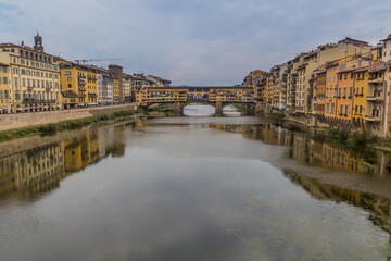 Arno river and Ponte Vecchio bridge in the center of Florence, Italy