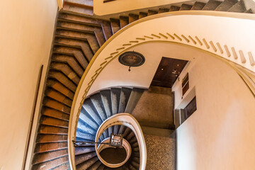 BOLOGNA, ITALY - OCTOBER 22, 2018: Spiral staircase of Isolani palace in Bologna, Italy © Matyas Rehak