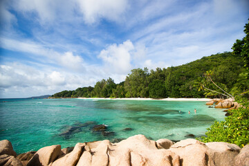 Blue sea and exclusive remote beach in Seychelles islands (La Digue)