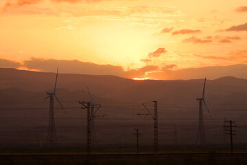 Wind generators at sunset.