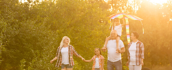 Multi Generation Family On Countryside Walk
