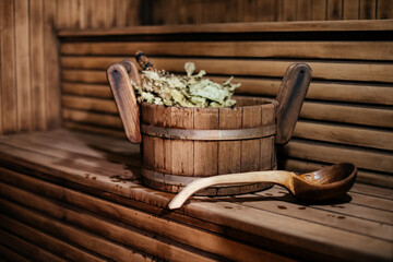Fototapeta na wymiar Traditional equipment for Russian bath from wood