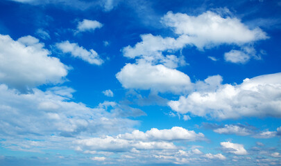 Naklejka na ściany i meble White clouds in blue sky