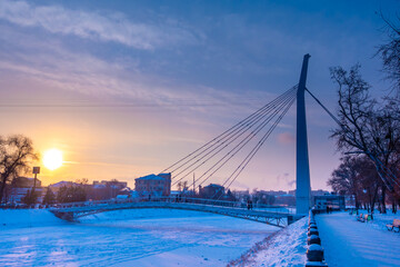 Kharkov, Ukraine - 19 January 2021: Winter view to snowy embankment of frozen Kharkiv river and...