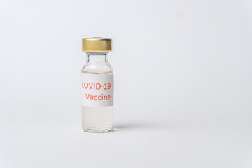 A single bottle vial of Covid-19 coronavirus vaccine in a research medical lab. Treatment for coronavirus covid-19.