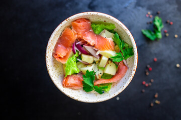 salmon fish seafood salad vegetables lettuce potato ready to eat on the table for healthy meal snack outdoor top view copy space for text food background rustic keto or paleo diet pescetarian