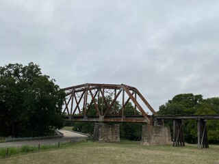 Fototapeta na wymiar railway bridge over river Fredericksburg to Comfort