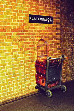 Famous platform 9 3/4 of Harry Potter in King's Cross Station, in London