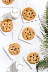 chocolate chip cookies on white wooden table