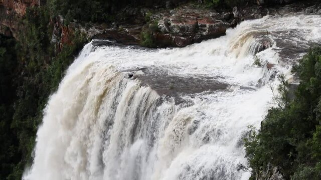 Static shot of the left side of Lisbon Falls in Grasskop, South Africa. The Lisbon falls are the highest (94m) waterfall in Mpumalanga, South africa. Filmed with a Canon 200D on a Tripod.