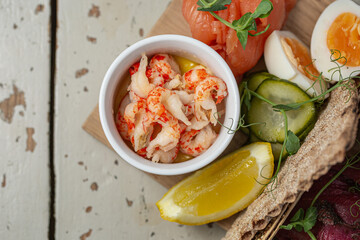 Scandinavian seafood planner - smoked salmon, gravalax, lobster tails, boiled eggs
