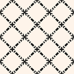 Fototapeta premium Vector ornamental seamless pattern. Elegant monochrome geometric ornament texture with flower silhouettes, crosses, grid, lattice, mesh. Abstract black and white floral background. Repeated design