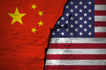 Conflict between countries. United States of America and China flags on the cracked concrete wall.  The deterioration of diplomatic relations. Confliction and crisis concept.