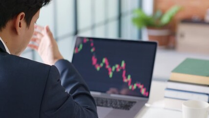 Stressed businessman feeling desperate on crisis stock market, investment concept.