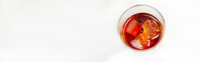 Excellent whisky served with ice cubes in a glass of Old fashioned type