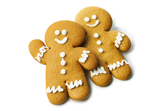 Two gingerbread cookies of man shape on white