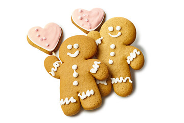 Gingerbread cookies shaped as man and heart on white