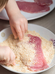 Covering Meat with Breadcrumbs