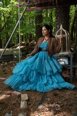 Fototapeta premium Beautiful Asian Indian woman in fashion shoot on location.