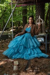 Fototapeta premium Beautiful Asian Indian woman in fashion shoot on location.