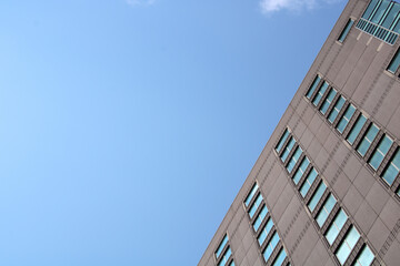 Abstract fragment of contemporary architecture, walls made of glass and concrete