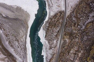 Scenic top down view of river Katun and road