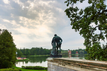 The Samson statue seen from behind with the pond and lake in view in the Gardens of Catherine Palace in Pushkin, Russia