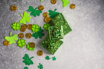 Happy st. Patrick's day. Card with  lucky clover, green gift box. Irish festival symbol. Lucky...