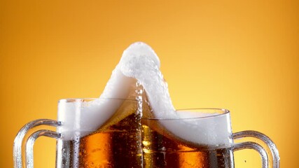 Super slow motion of beer glasses in cheers gesture. Filmed on high speed cinema camera, 1000 fps. - Powered by Adobe
