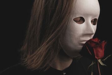 a romantic woman in a white mask