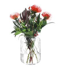 Vase with bouquet of beautiful protea flowers on white background