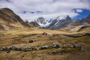 A settlement with Mountain panorama near the Janca (Mitacocha) campsite, Cordillera Huayhuash circuit, Ancash, Peru