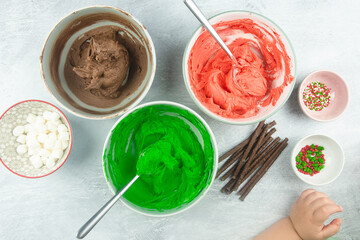 bowls of different coloured frosting