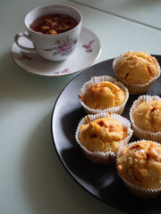 Salty muffins on a dark plate