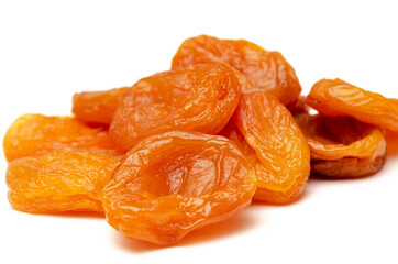 Appetizing yellow dried apricots on a white background