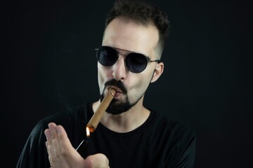 man smoking cigarette