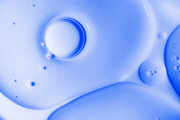Fondo abstracto psicodélico de gotas de agua y aceite con tinta de color azul