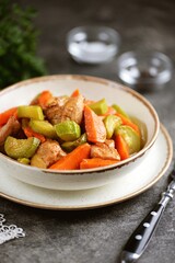 Turkey fillet with carrots, onions and zucchini. Healthly food.