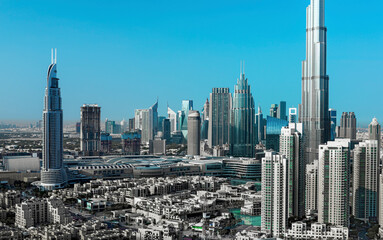 Dubai - amazing city center skyline with luxury skyscrapers and beautiful sky at sunrise, United Arab Emirates

